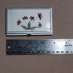 Business card holder with floral design, made of aluminum, very sleek